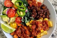 Hearty Vegan Breakfast Bowl with Quinoa, Avocado & Tofu