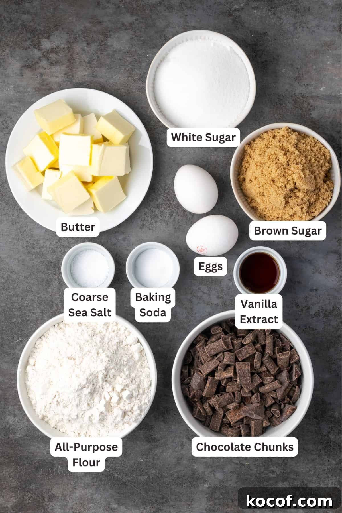 Buttery, chewy chocolate chip cookie bars are easy to make and perfect for baking and slicing into squares, no chilling or rolling required! Chocolate chip cookie bars ingredients with text labels overlaying each ingredient.