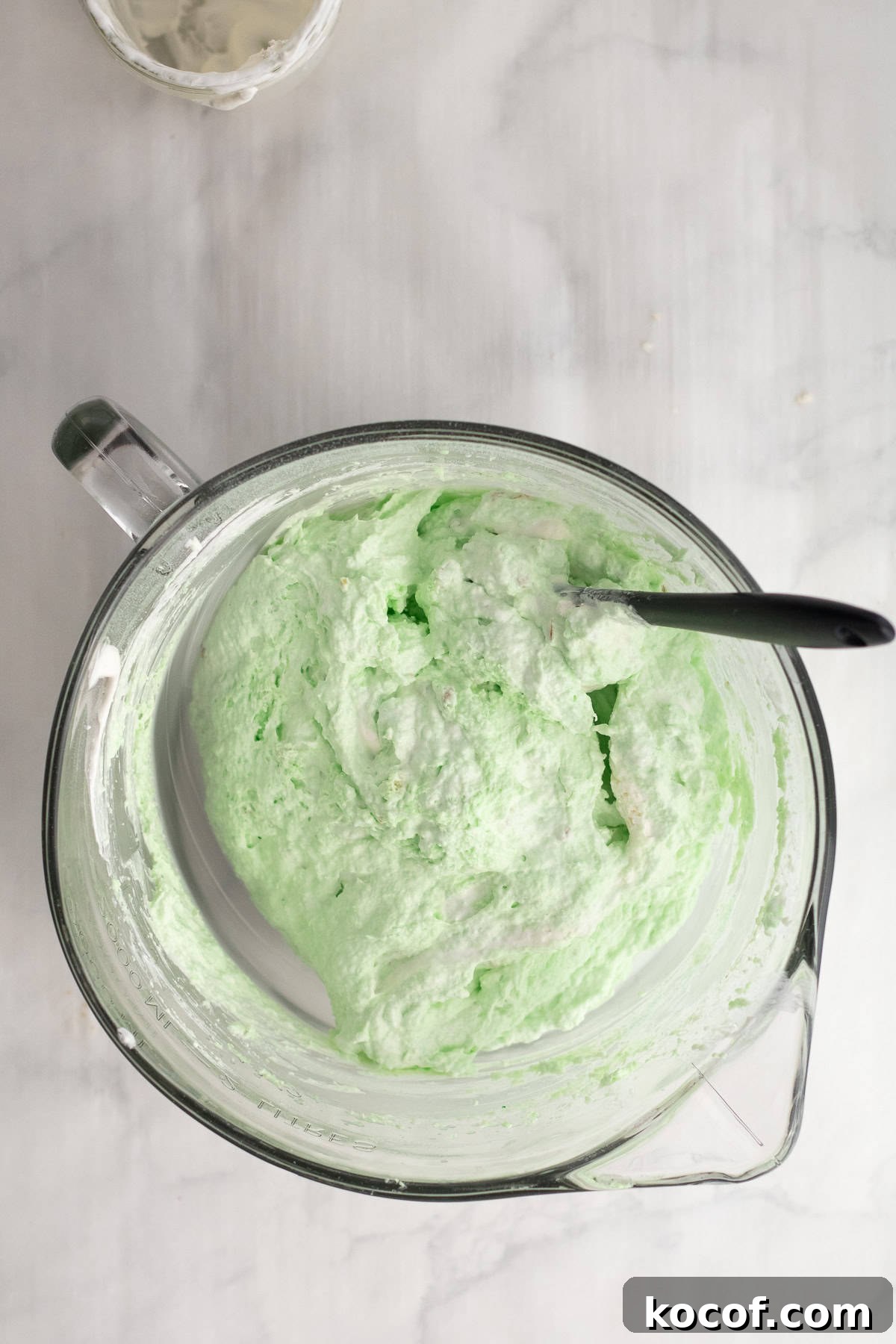 pie filling fully mixed together in a glass bowl