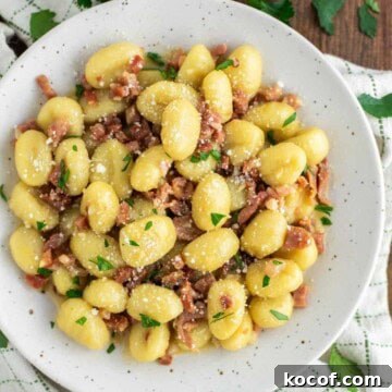 Gnocchi carbonara in pasta bowl.