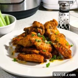 instant pot harissa wings featured close up