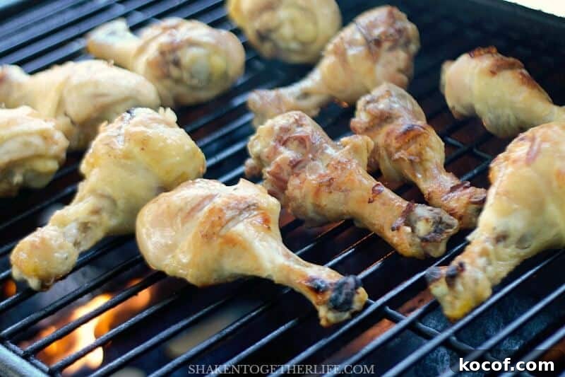 Grilled Honey Mustard Drumsticks - this recipe starts with quick boiled chicken drumsticks that are grilled over medium heat