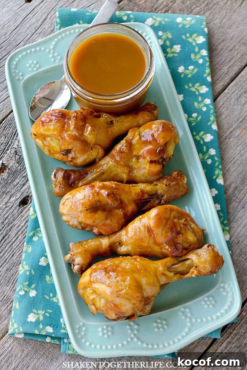 These Grilled Honey Mustard Drumsticks are dripping in a gloriously sticky glaze! This easy grilling recipe is perfect for those upcoming picnics and any outdoor entertaining!