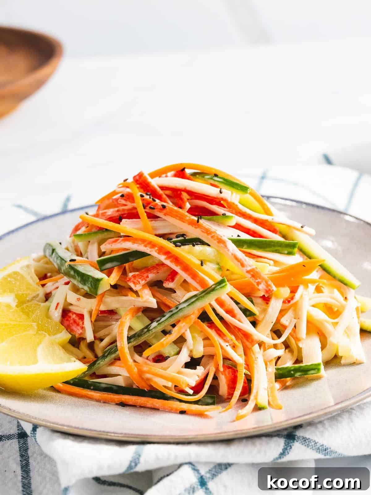 Crunchy Kani Salad Recipe with Crab Sticks and Fresh Veggies 7 Kani salad made with crab stick, carrots, and cucumbers dressed in a mayo dressing.
