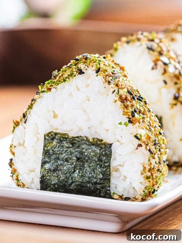 Crunchy Kani Salad Recipe with Crab Sticks and Fresh Veggies 8 Easy onigiri or Japanese rice balls with nori wrap and furikake.