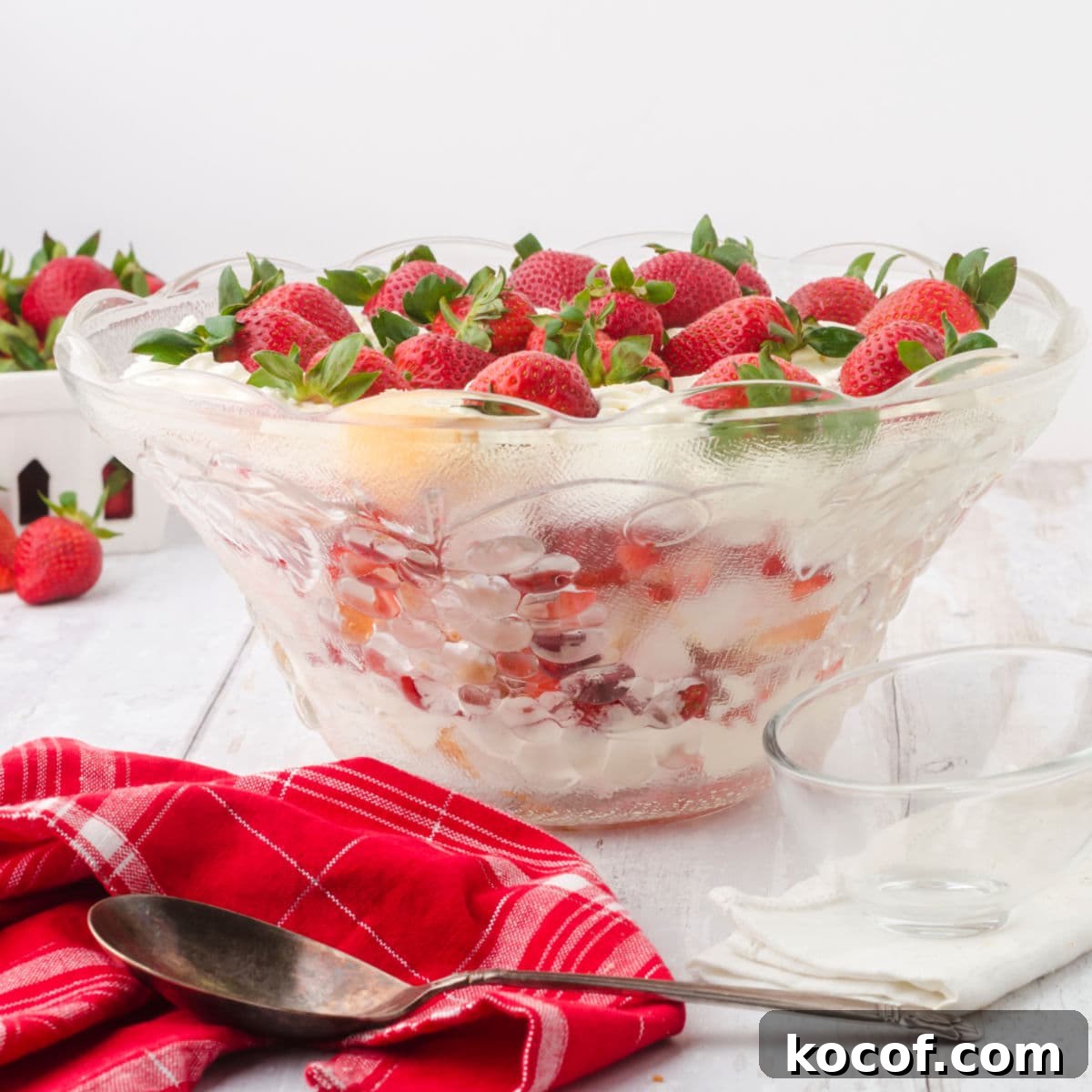 Classic Summer Strawberry Dessert Recipes You’ll Love 6 Close up of the finished cake in a bowl.
