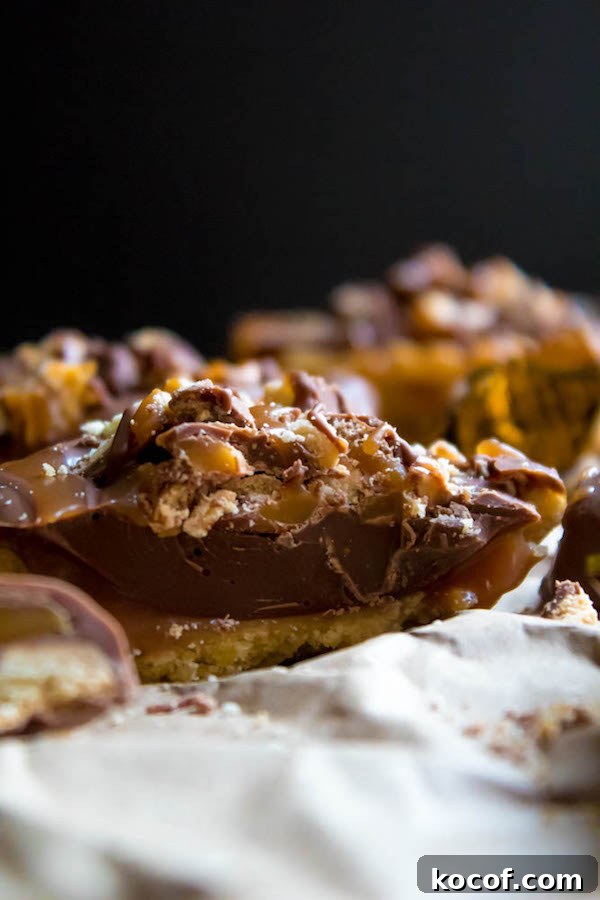 Mini Twix Tart Recipe: Caramel Chocolate Cookie Tarts 6 Mini Twix Tarts garnished with chopped Twix