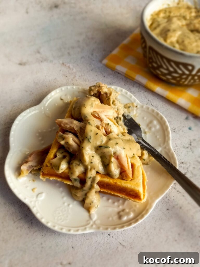 Amish chicken and waffles on a plate.
