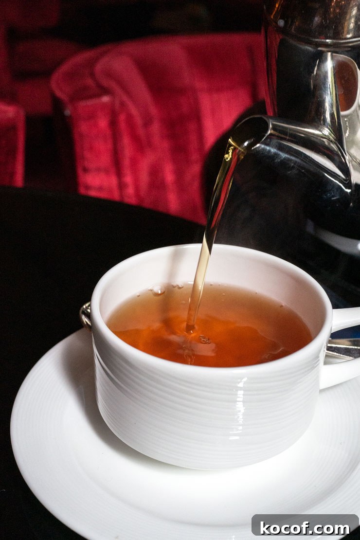 Cup of tea being poured at Four Seasons New York