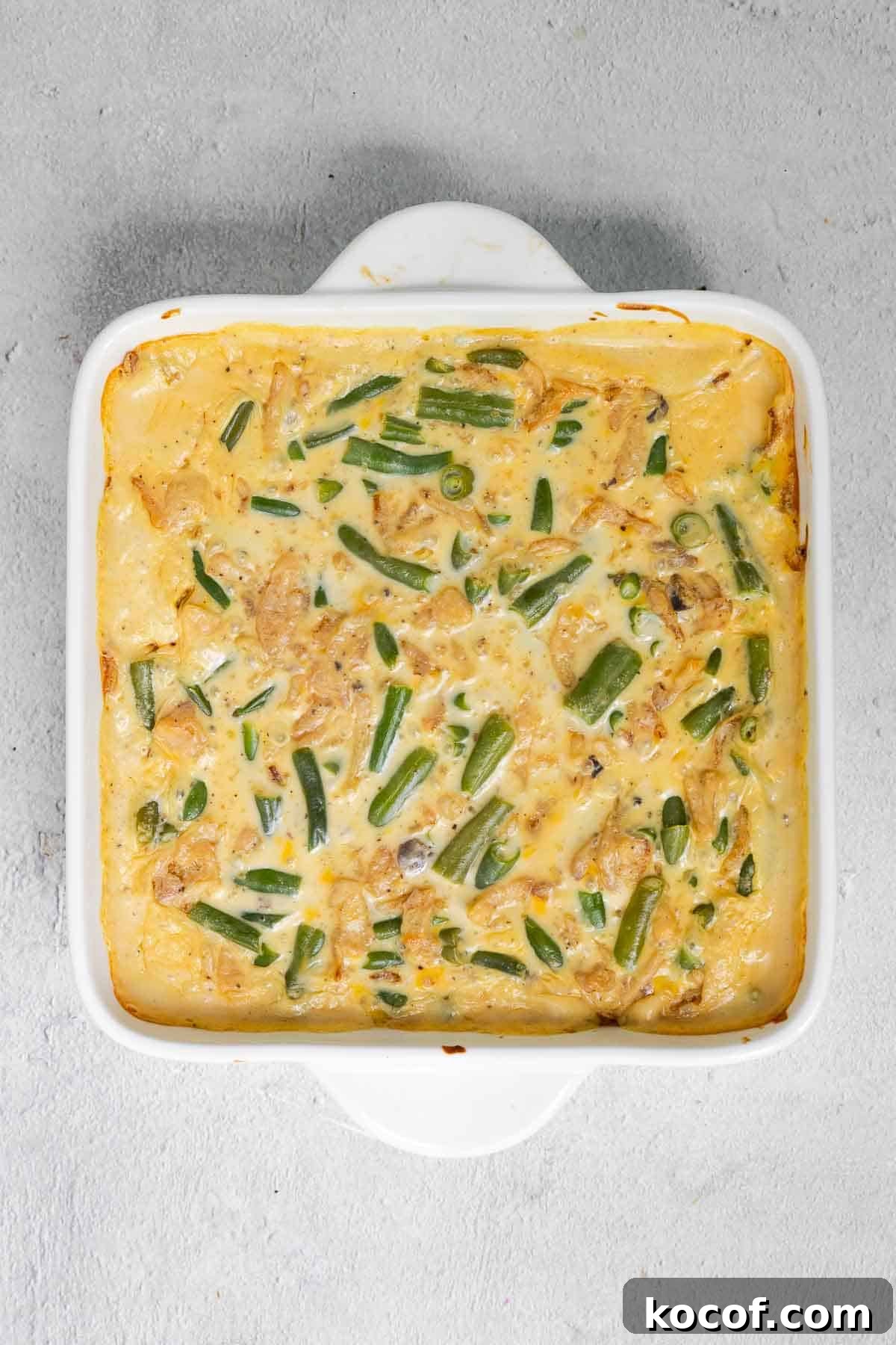 Velveeta Green Bean Casserole Recipe: Creamy, Cheesy Holiday Side 7 The green bean mixture is baked until warmed through and bubbling.