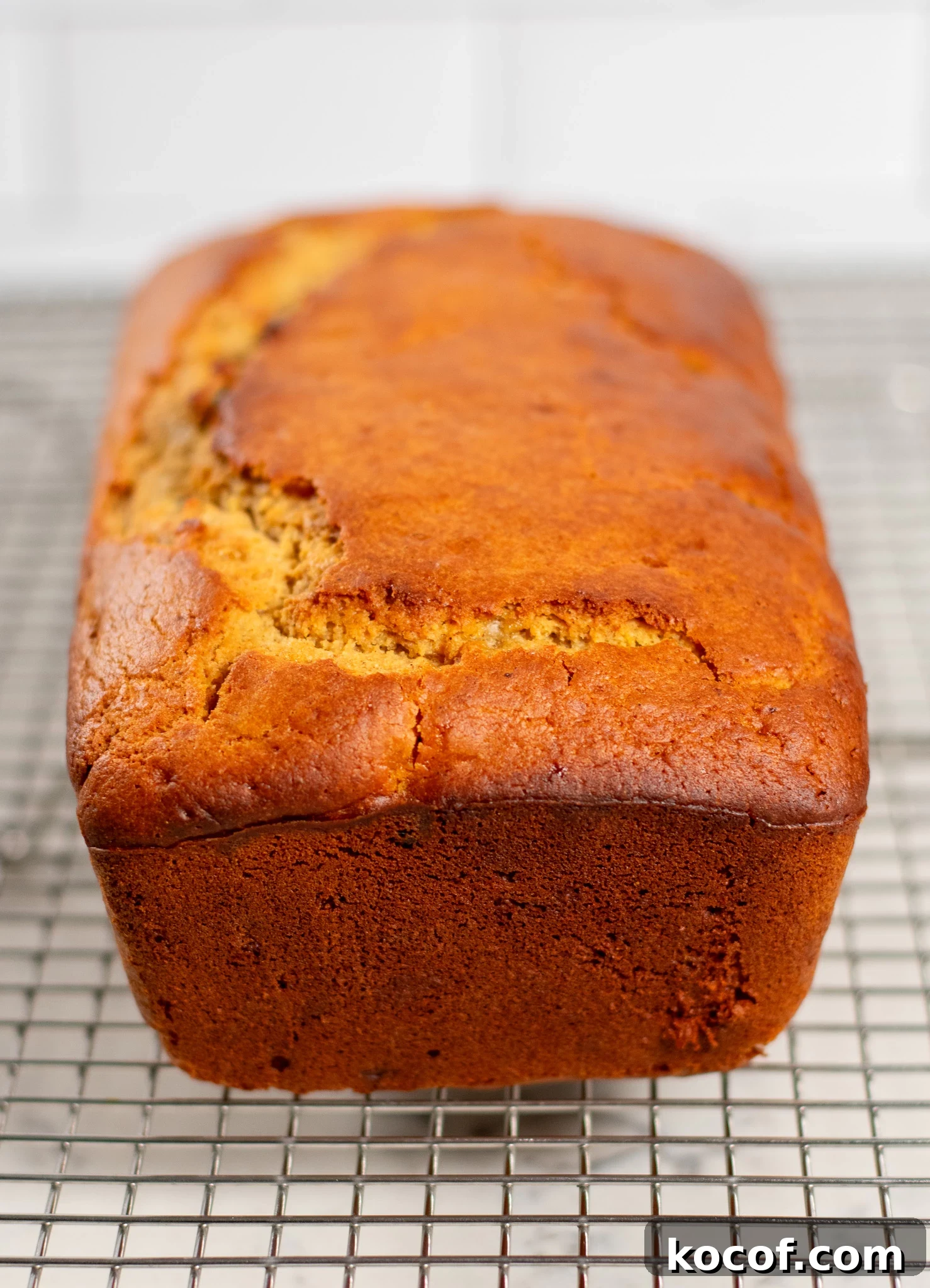 A christmas loaf cake with raisins and orange peel.