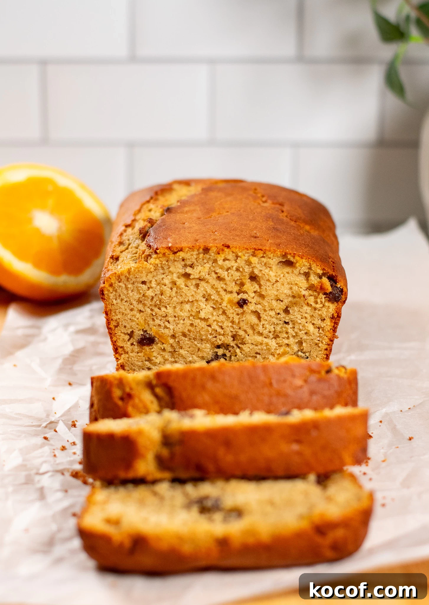 A christmas loaf cake with raisins and orange peel.