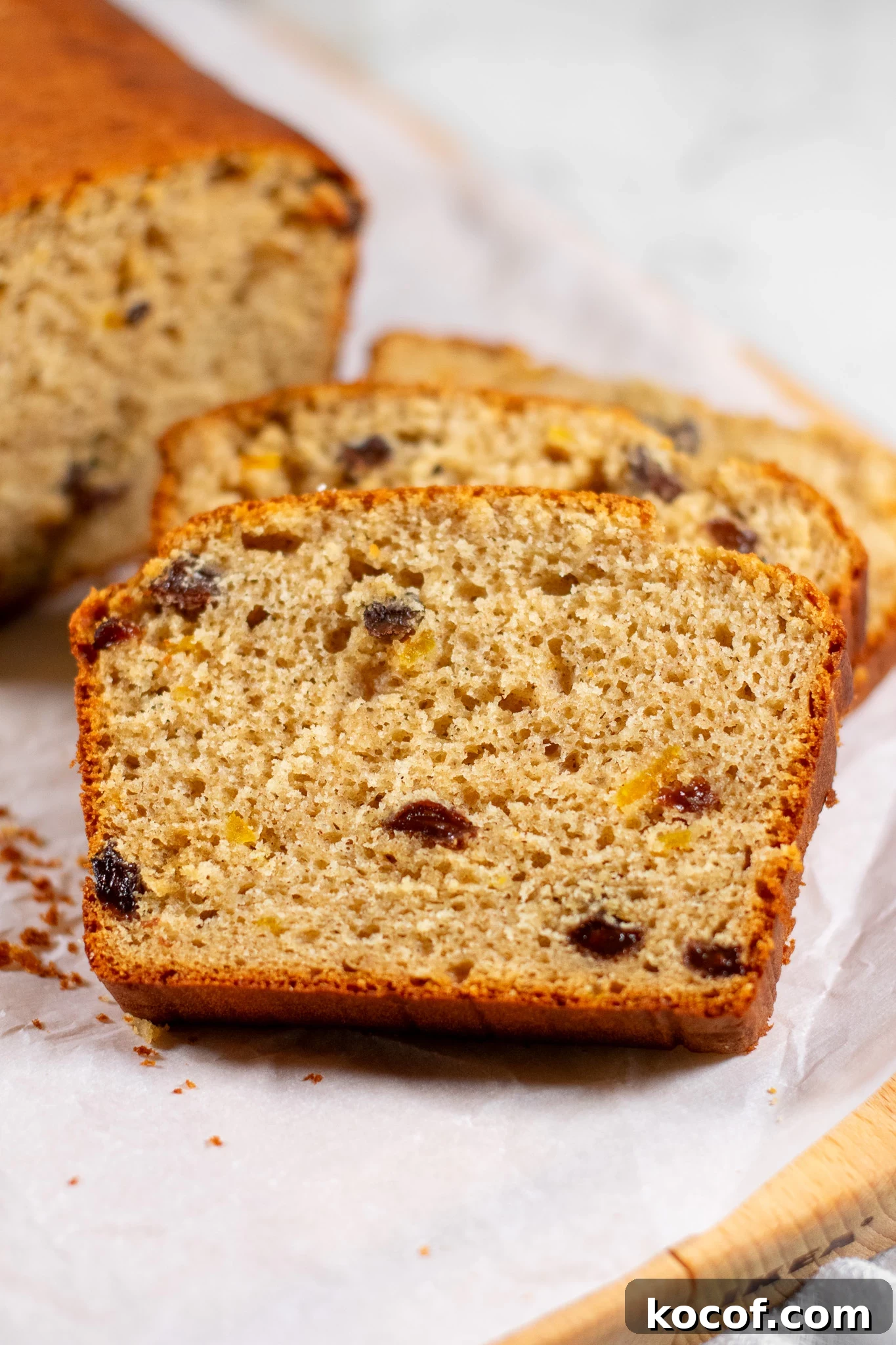A christmas loaf cake with raisins and orange peel.