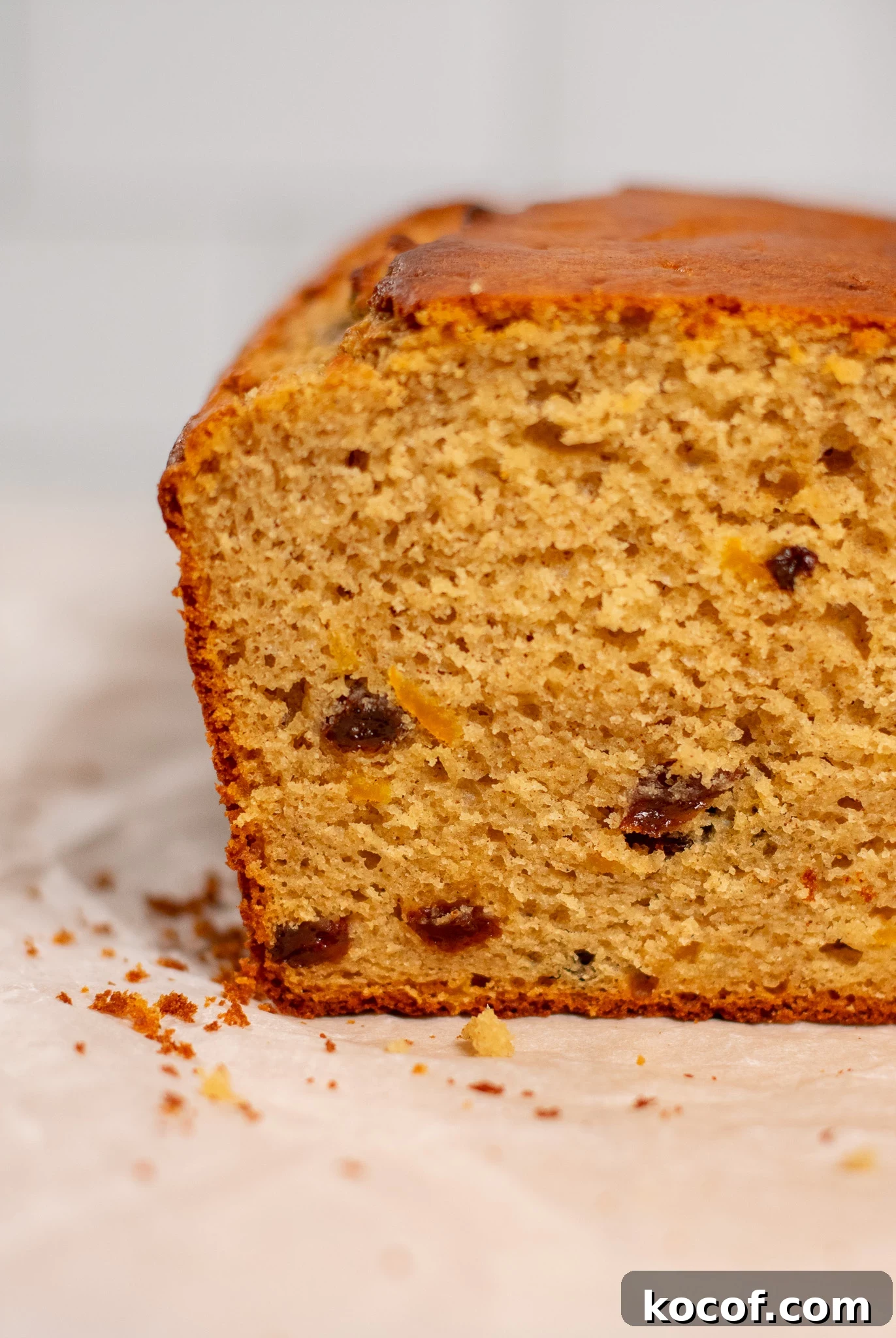 Closeup of christmas cake with raisins and orange peel.