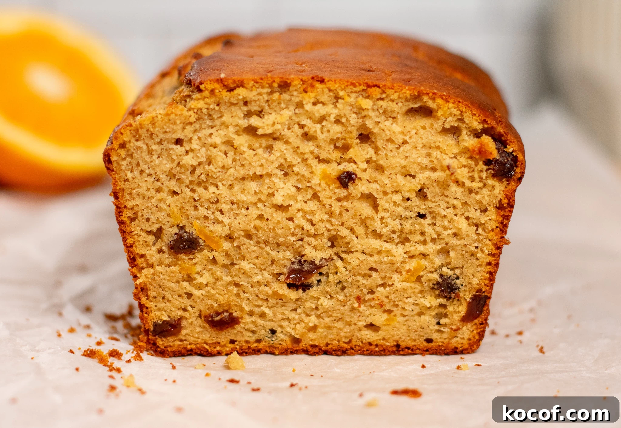 A christmas loaf cake with raisins and orange peel.