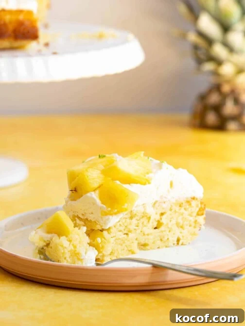 a slice of pina colada cake