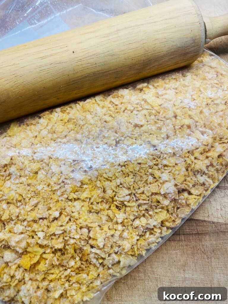 Blackstone Frosted Flake French Toast Recipe — Crispy Sweet Skillet Breakfast 3 crushed frosted flakes in a bag