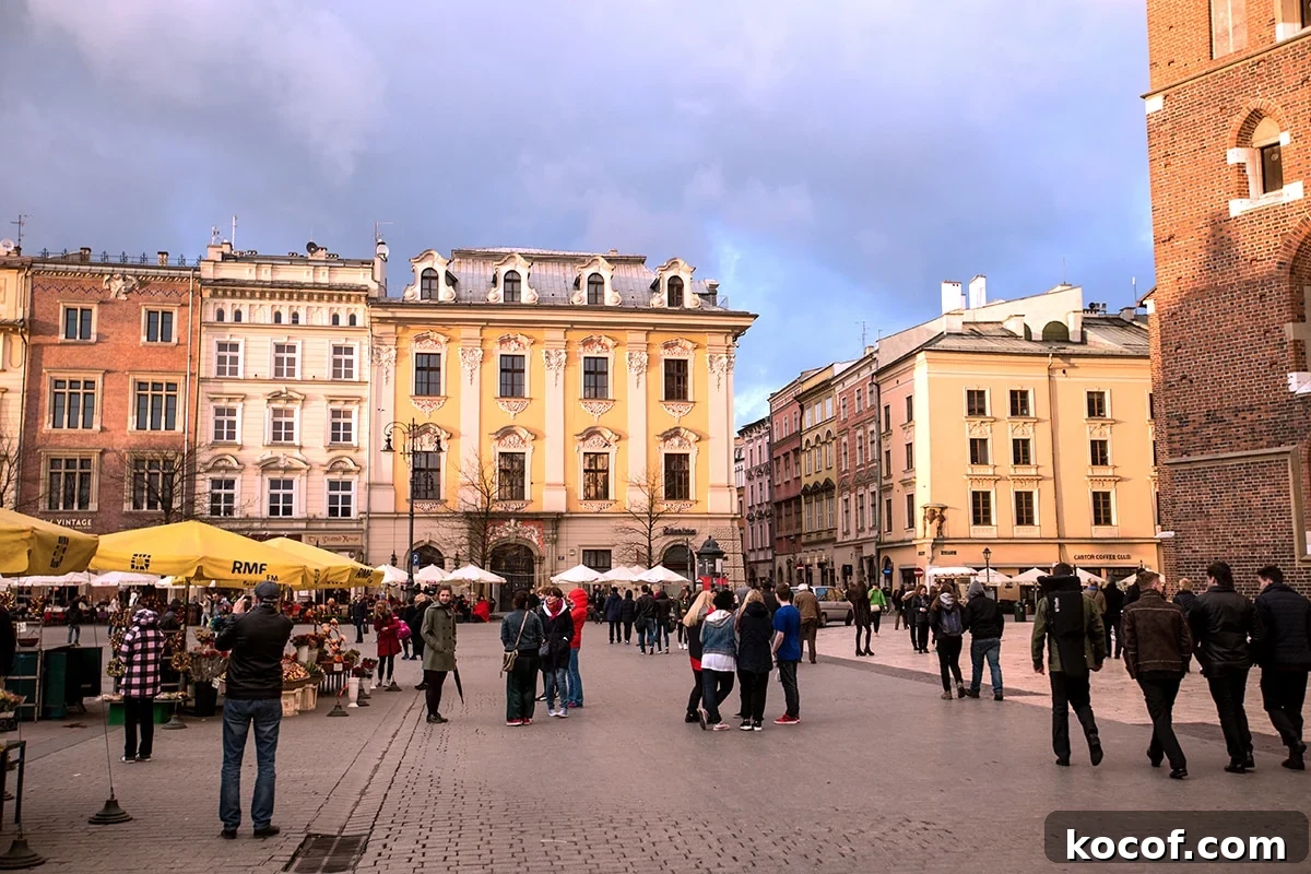 People walking in Krakow Main Square.