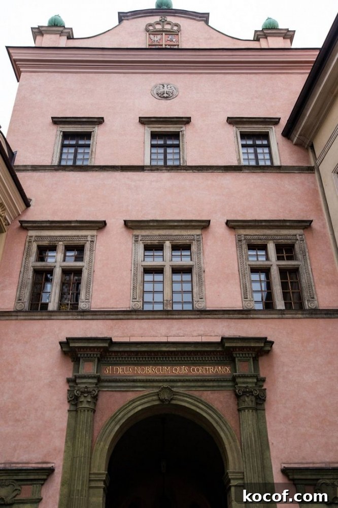 The building in Krakow is pink.