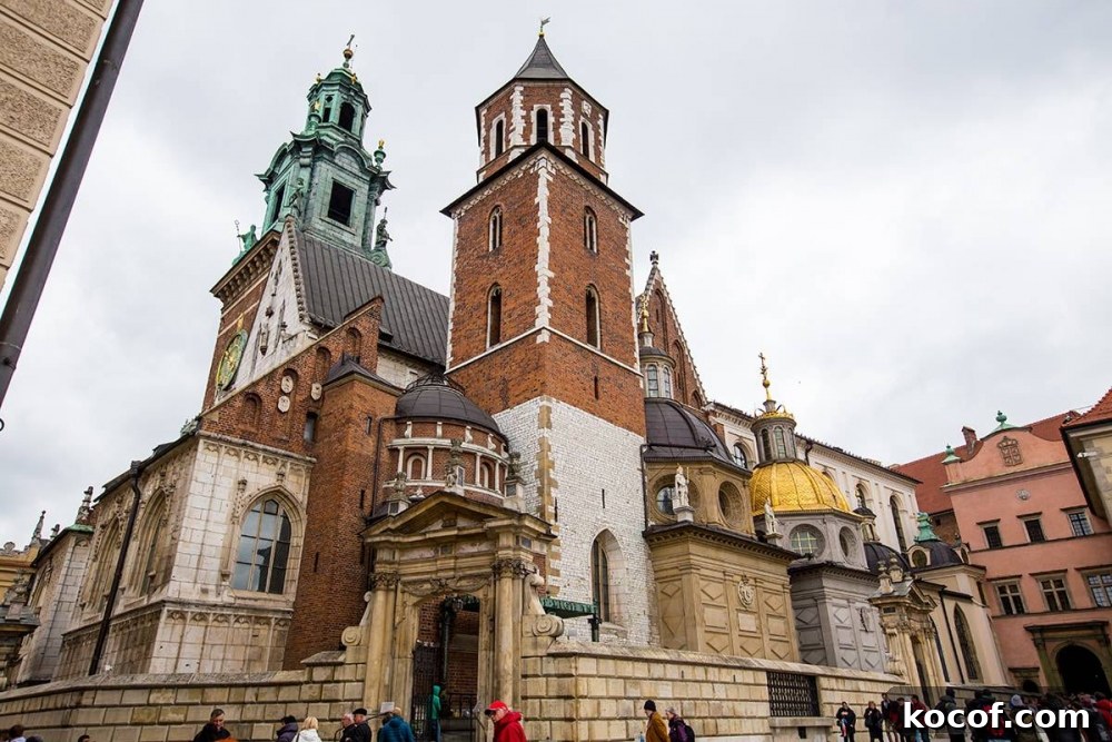 A cathedral with two towers in the heart of Krakow.