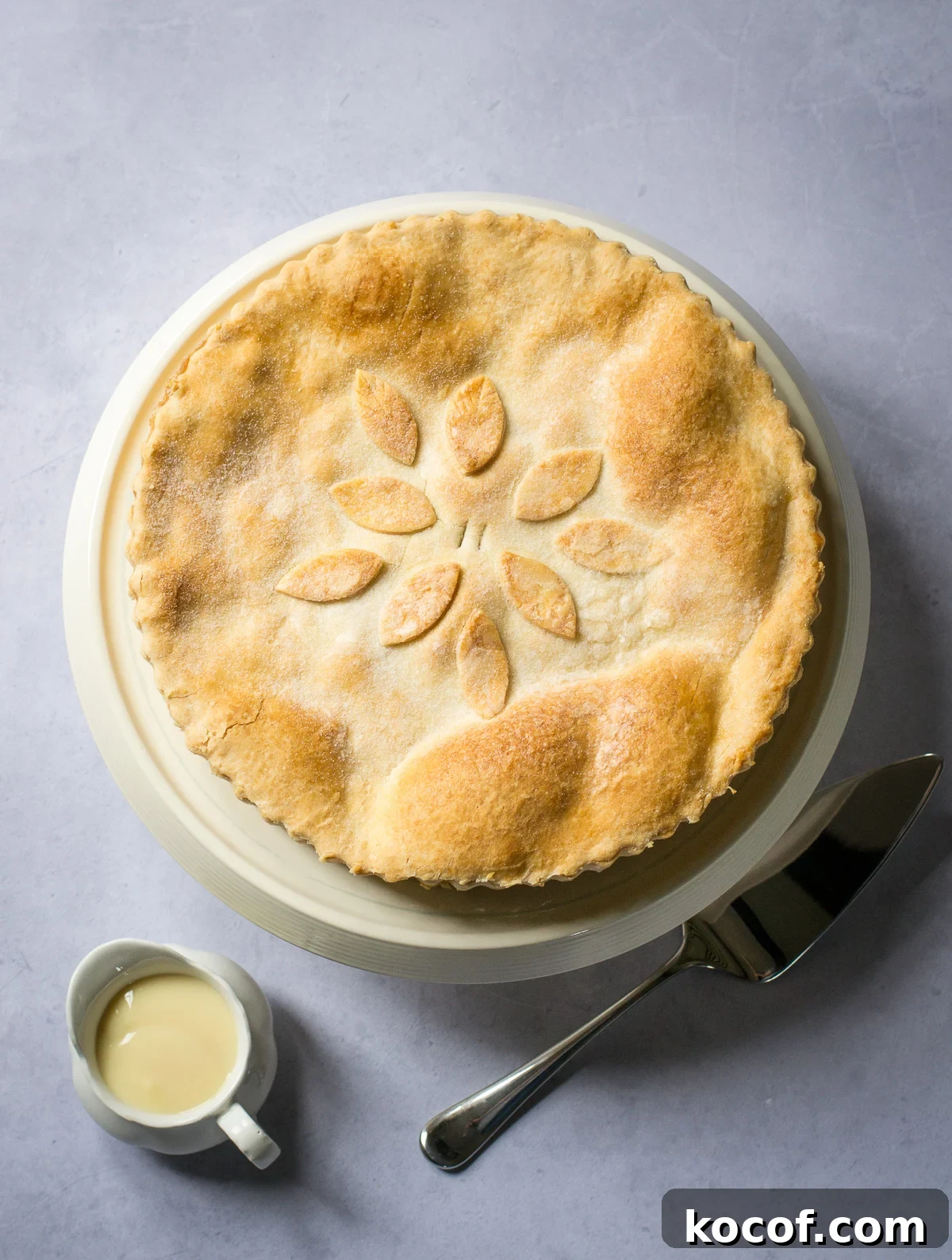 Whole Apple Pie with pastry decoration