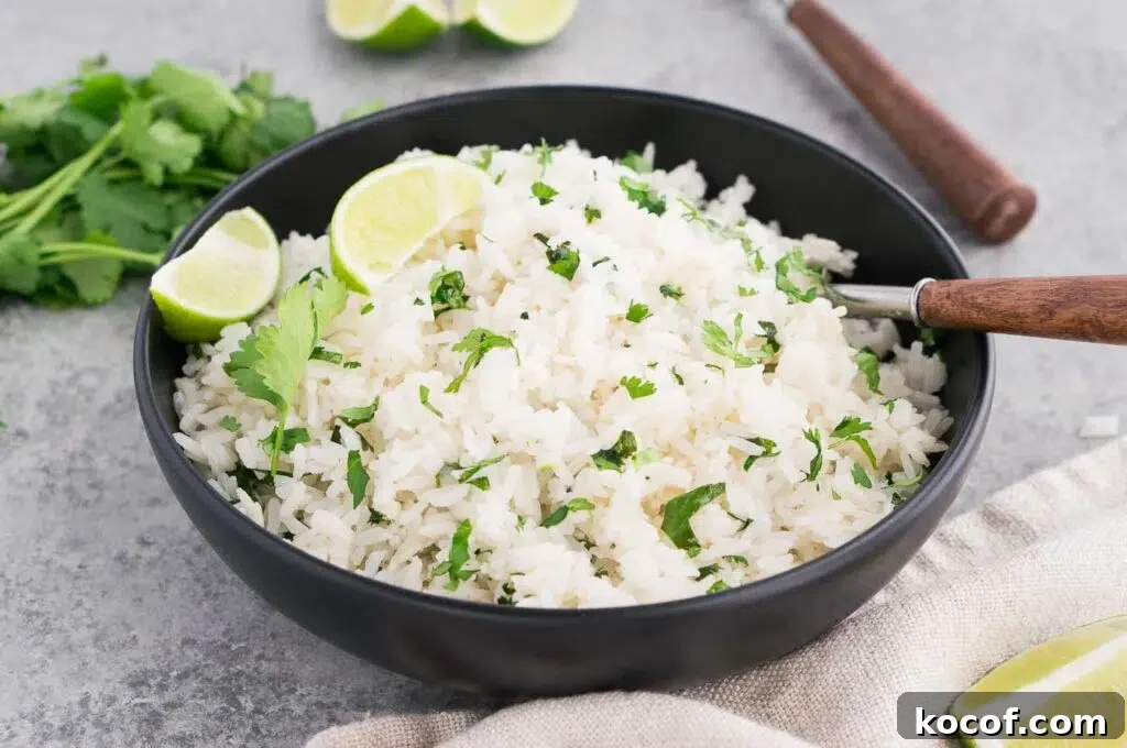 Cilantro Lime Rice Recipe: Flavorful Aromatic Side Dish 3 cilantro and lime rice in a black bowl