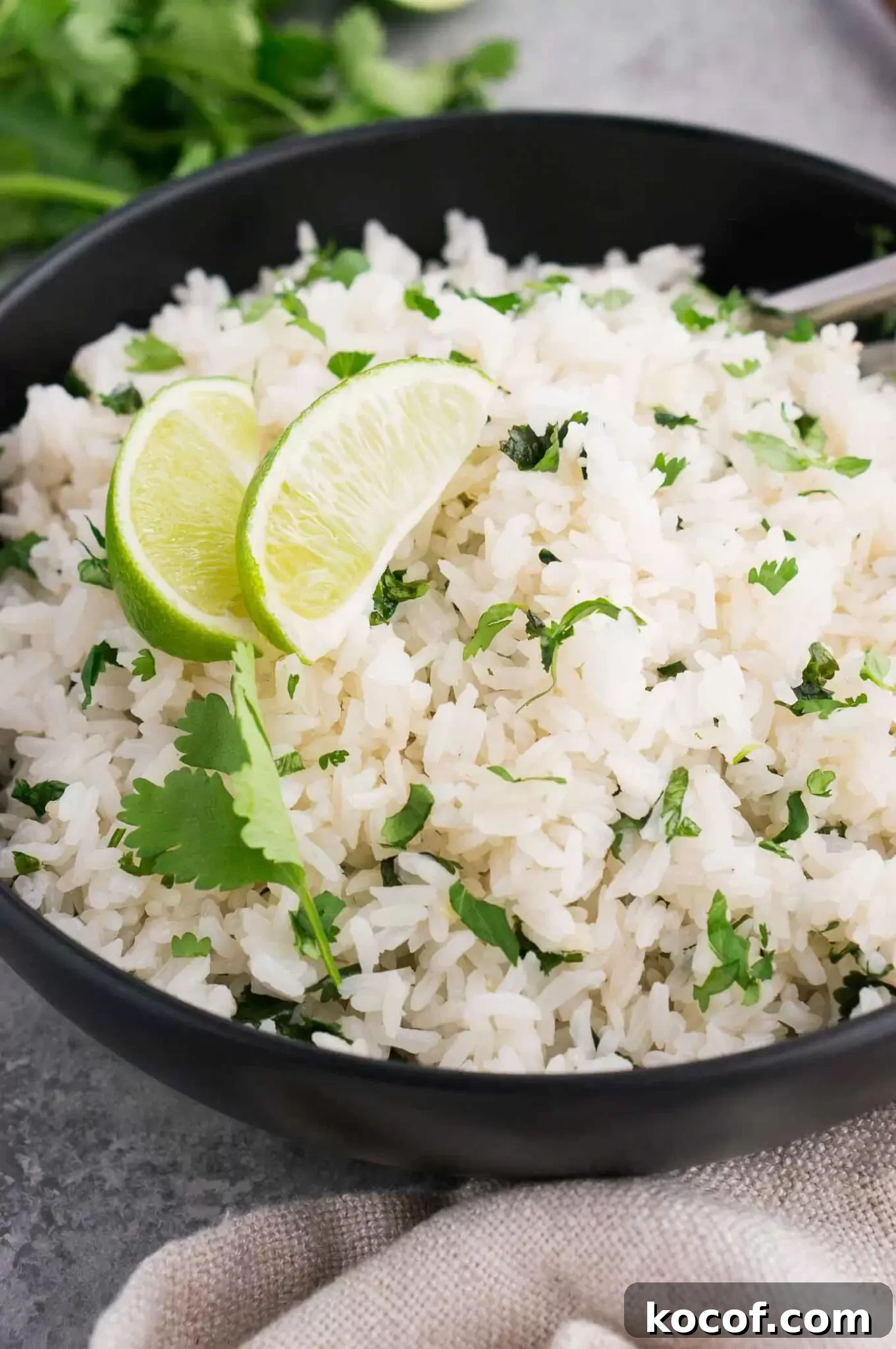 Cilantro Lime Rice Recipe: Flavorful Aromatic Side Dish 6 close up image of rice with lime and cilantro