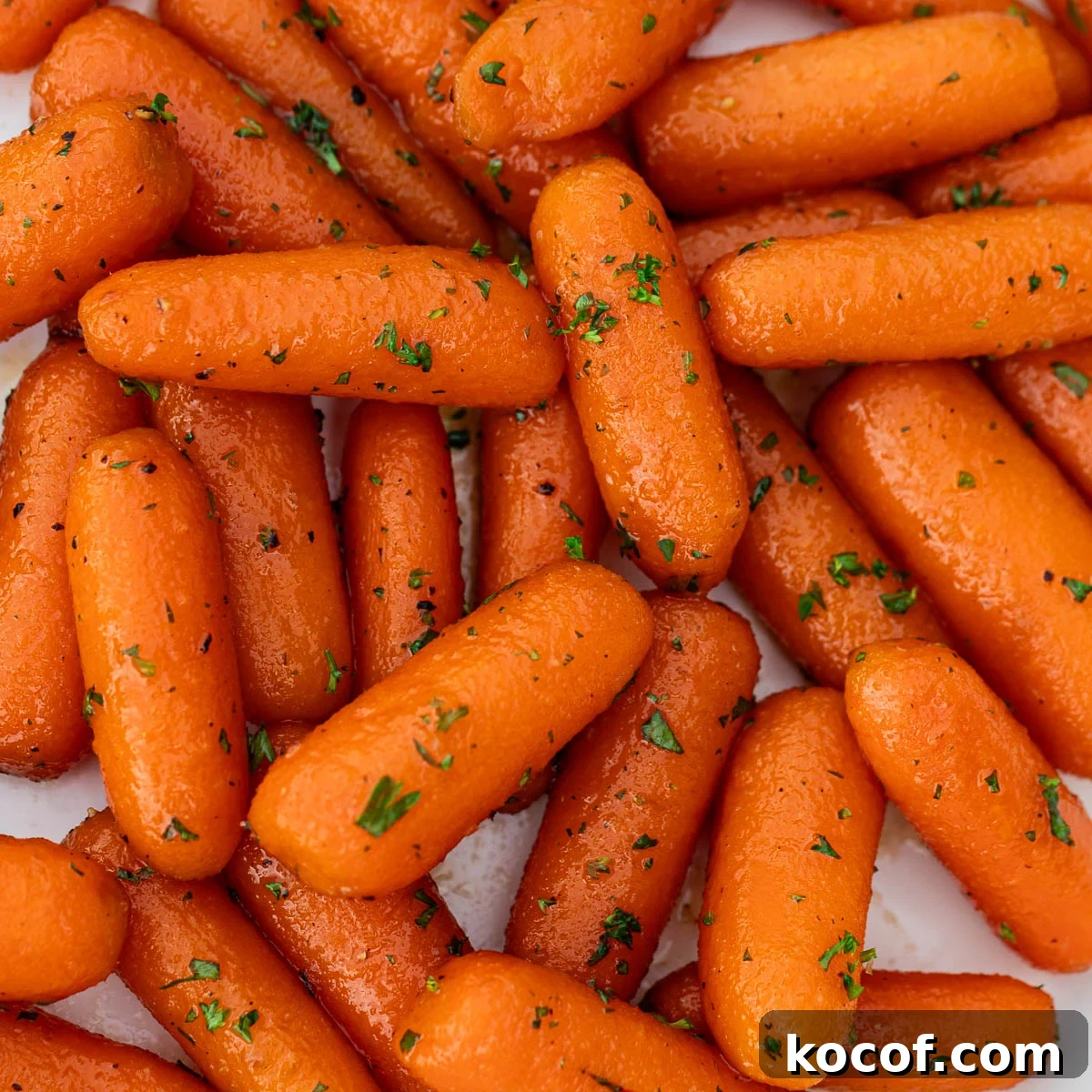 Crispy Pan-Fried Brussels Sprouts with Bacon and Garlic 14 Square image of glazed carrots.