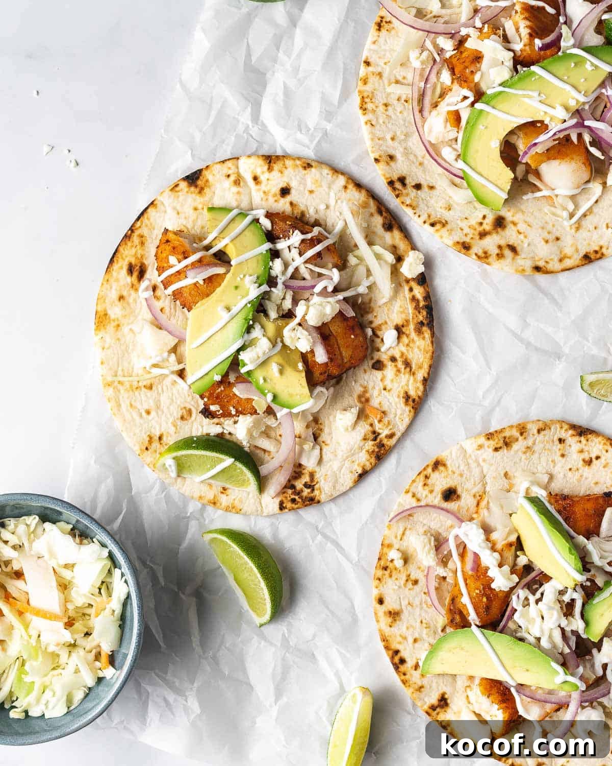 Overhead view of air fryer fish tacos.