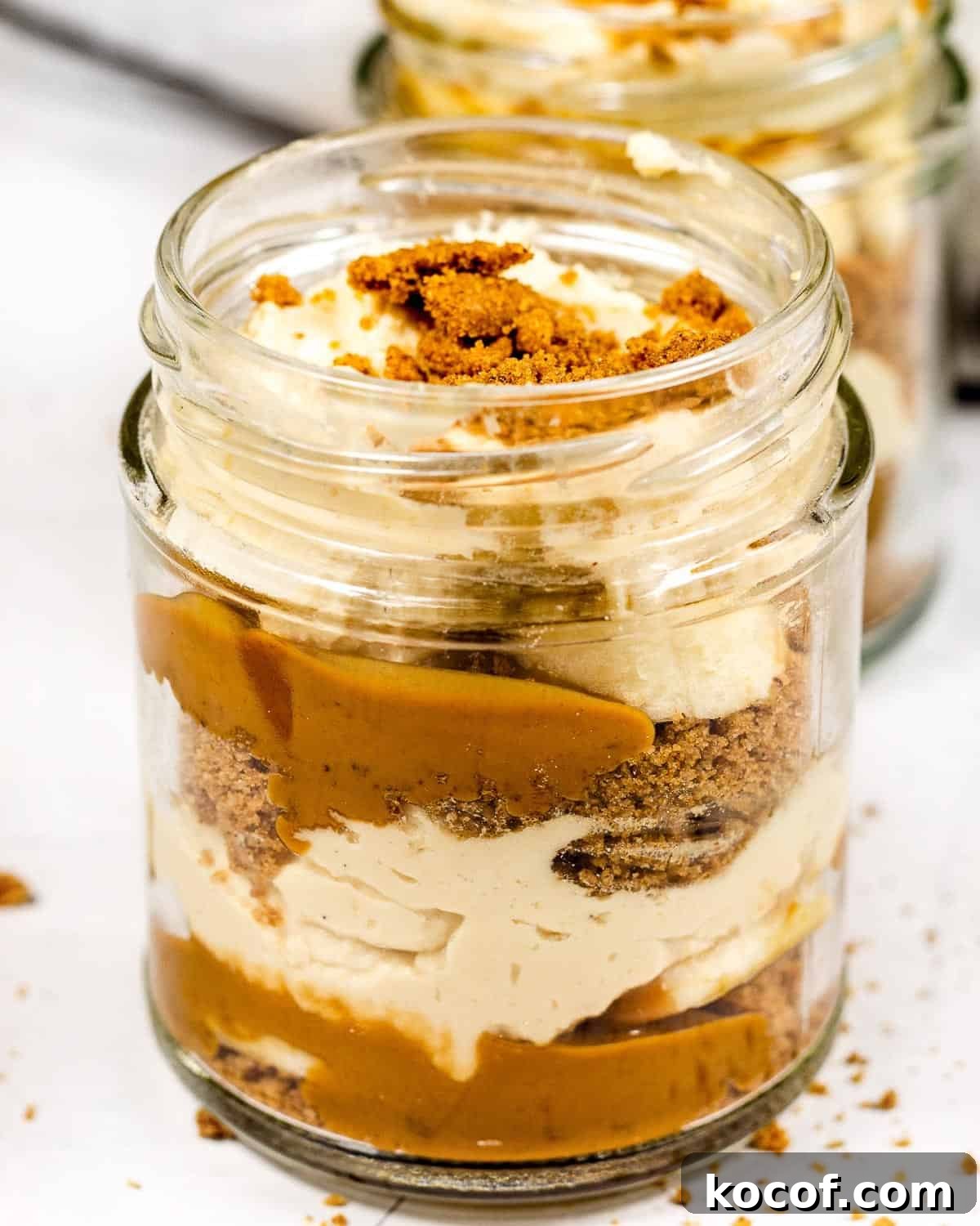 Two biscoff banoffee pie jars.