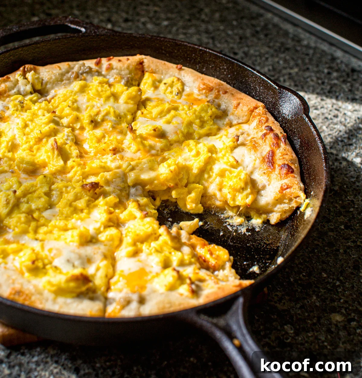 homemade breakfast pizza baked in a cast-iron skillet breakfast pizza recipe with sausage gravy and a homemade pizza dough recipe