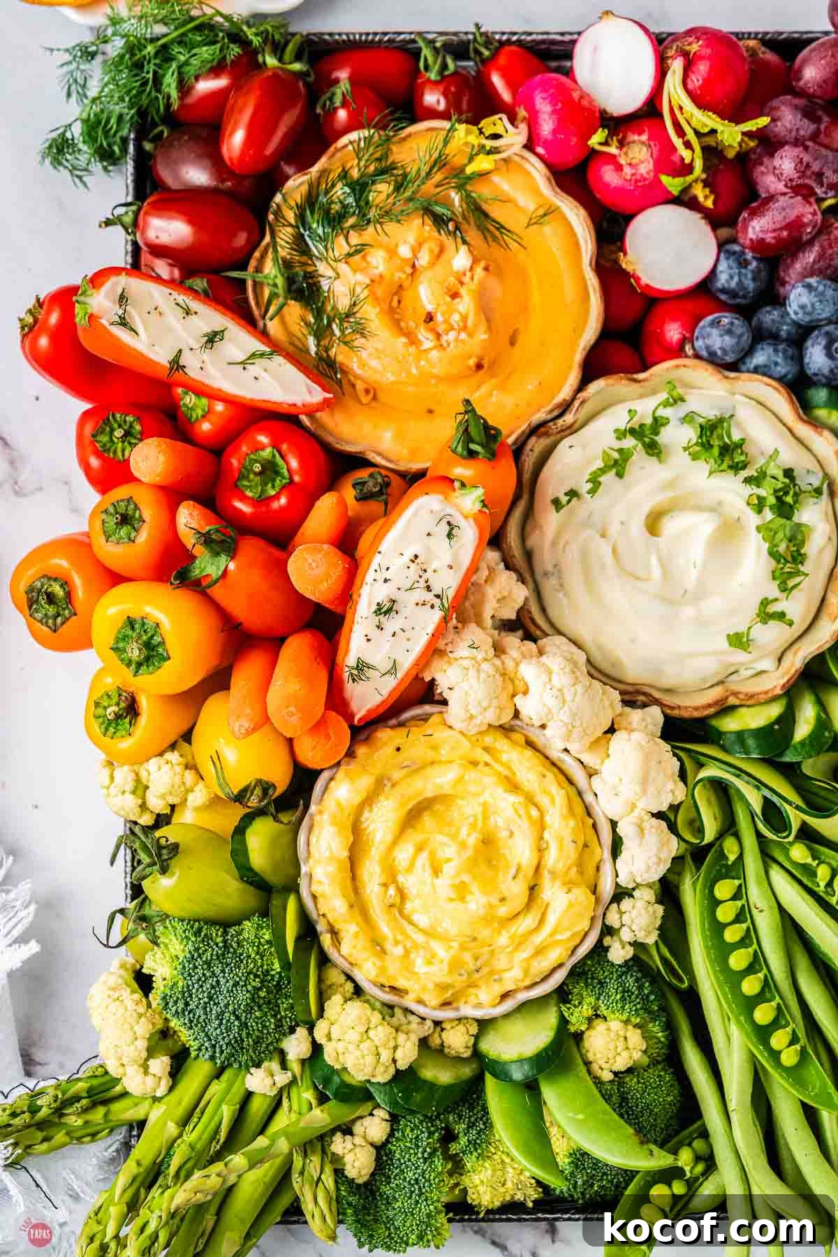 stuffed peppers and bowls of dips