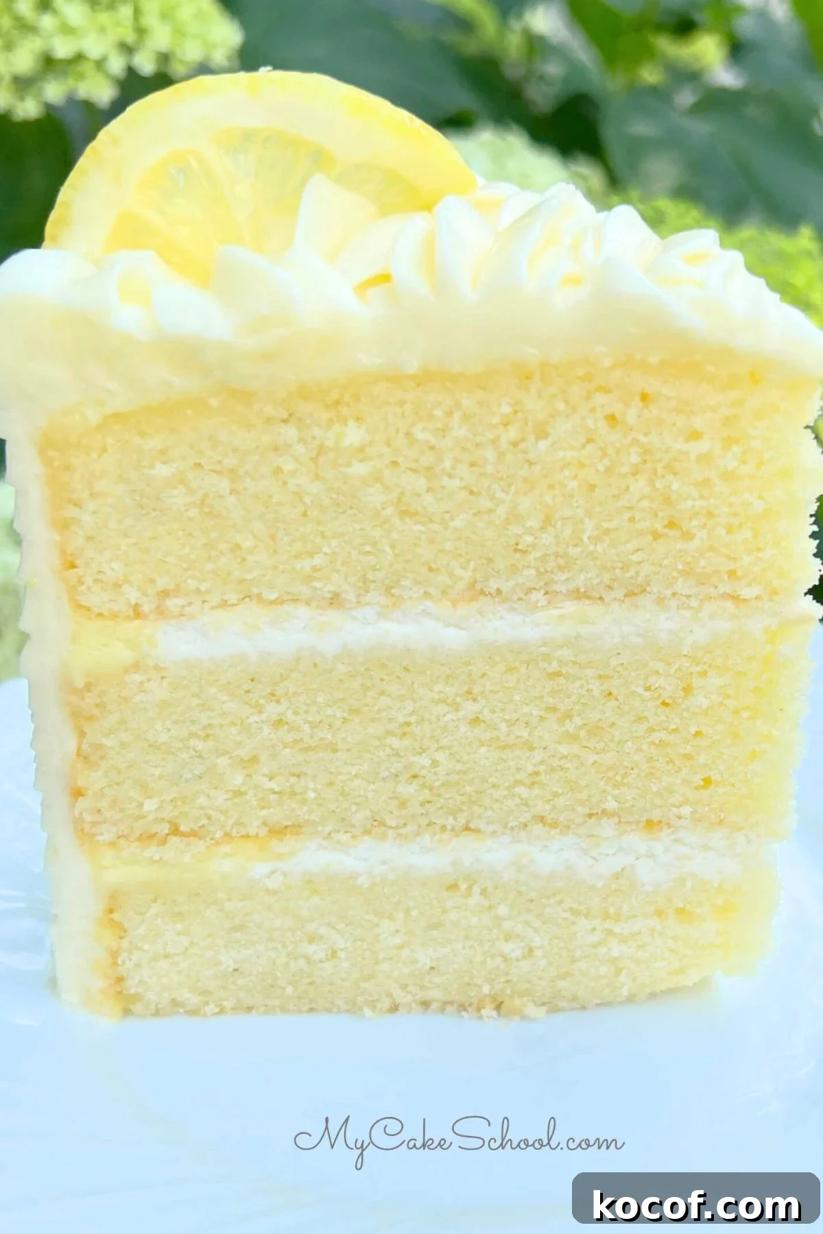 Slice of Lemon Mascarpone Cake on a plate.