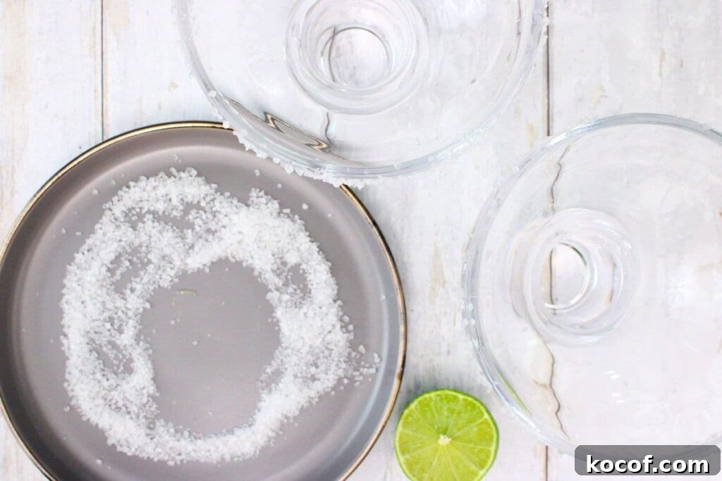rub a lime around the glass rim then dip in salt