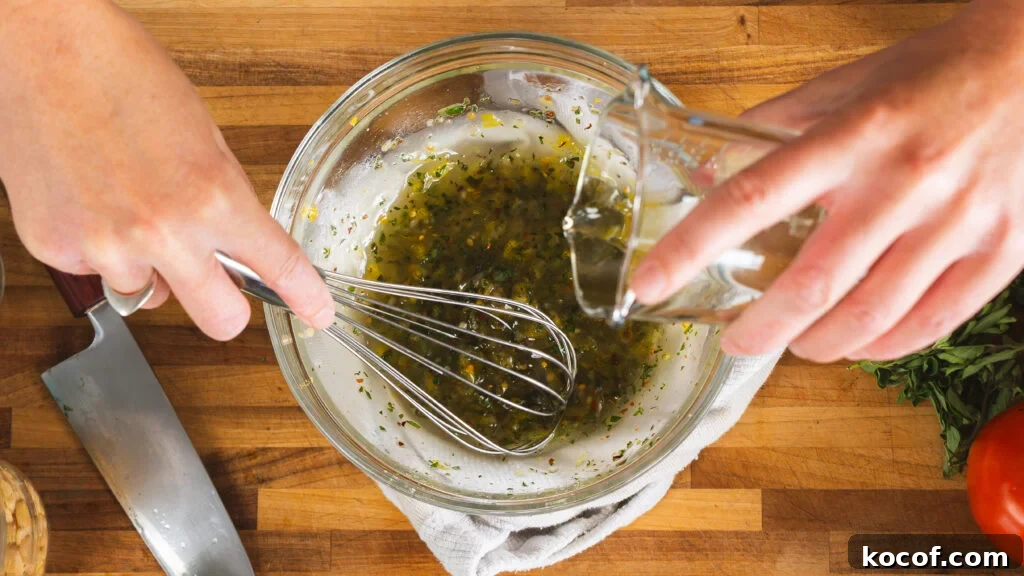 A homemade salad dressing for our zucchini tomato salad