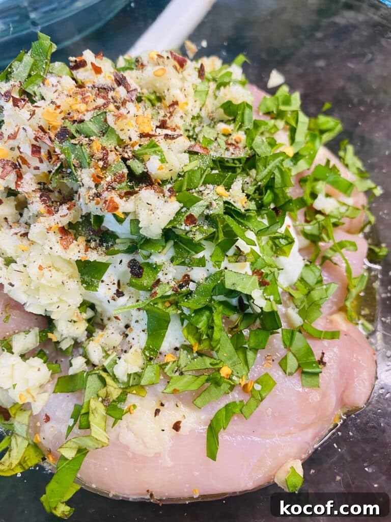 Mediterranean Grilled Chicken Salad with Lemon Herb Dressing 3 chicken marinade before mixing in a bowl