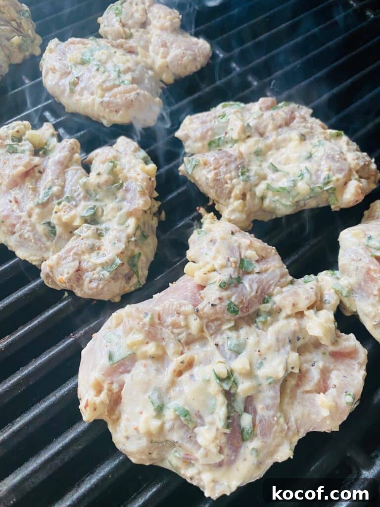 Mediterranean Grilled Chicken Salad with Lemon Herb Dressing 4 Grilled Lemon Basil Chicken on the grill before cooking