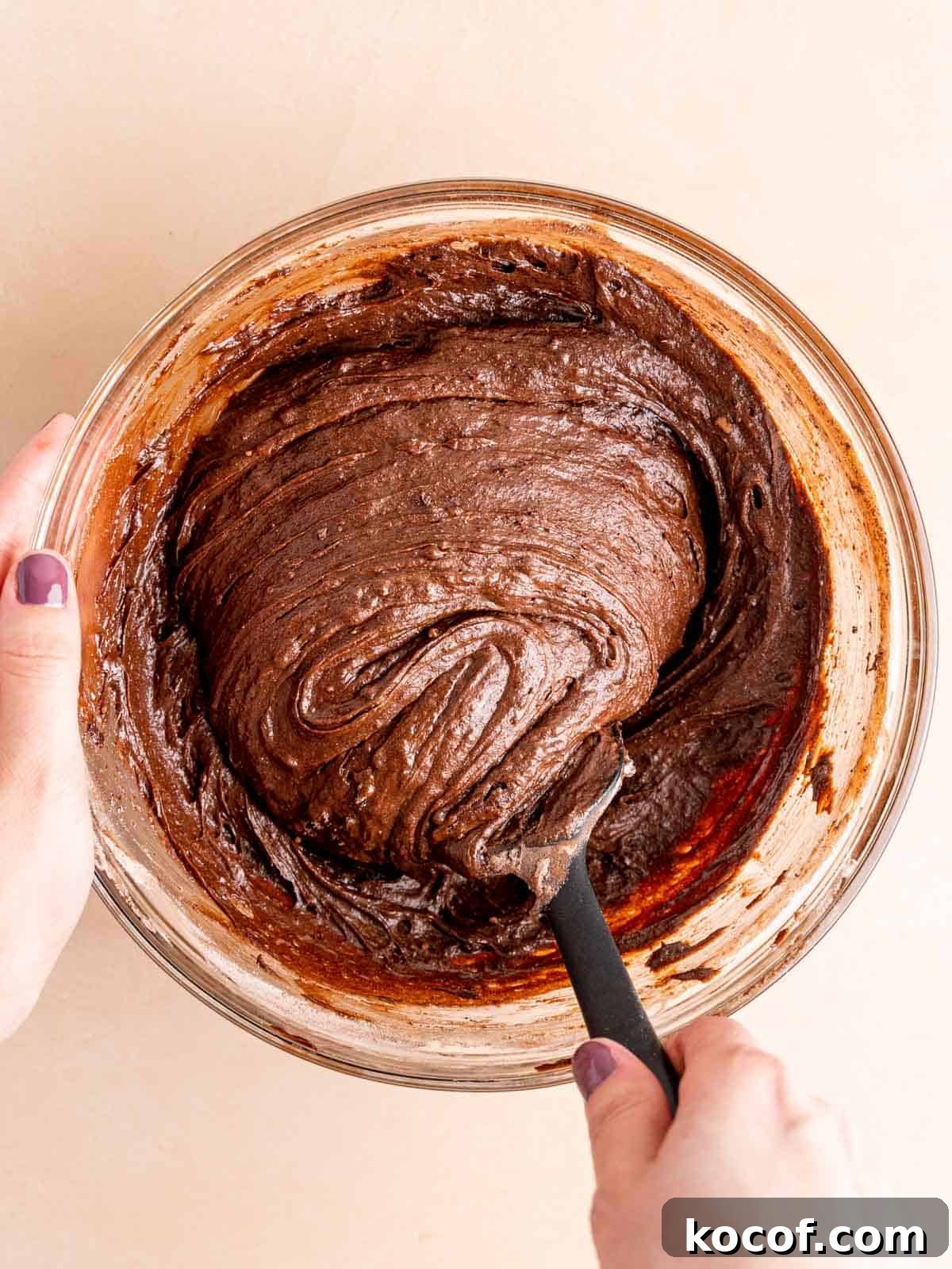 Homemade Chocolate Peanut Butter Brownies Recipe 6 Folding flour, cocoa powder, and salt into brownie wet ingredients.