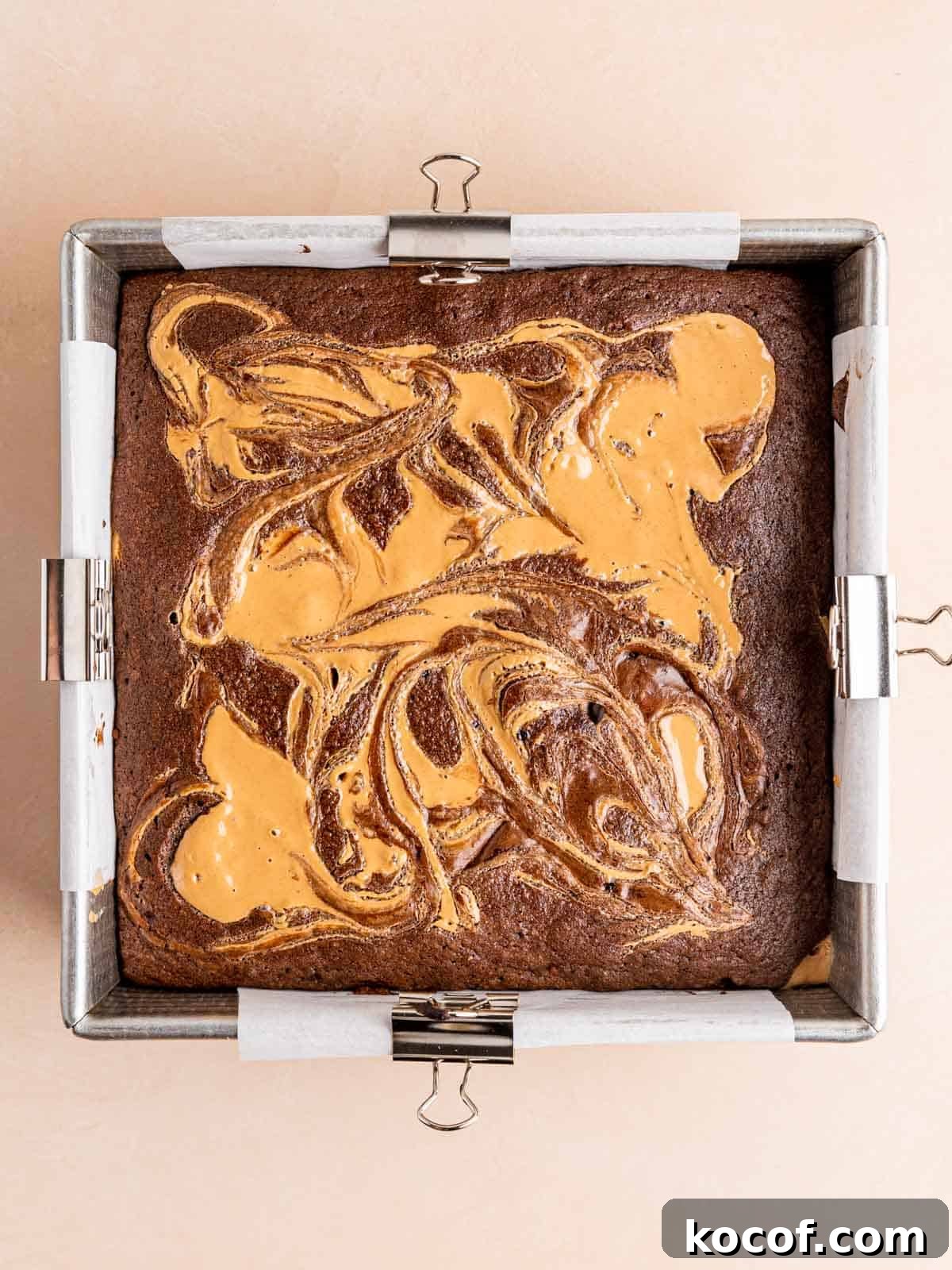 Homemade Chocolate Peanut Butter Brownies Recipe 9 Baked chocolate peanut butter brownies in a pan.