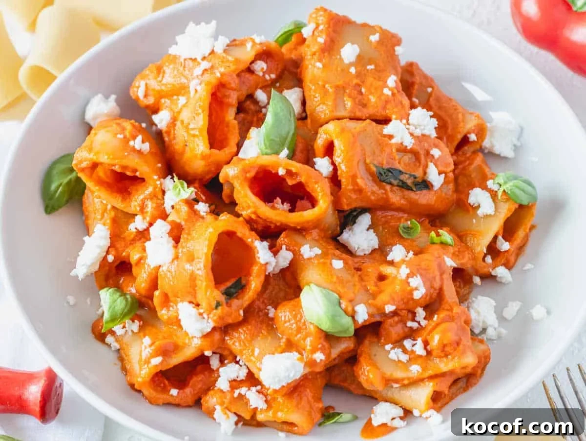 Delicious Vegan Pasta Recipes for Quick Weeknight Dinners 11 high protein pasta with feta and fresh basil leaves