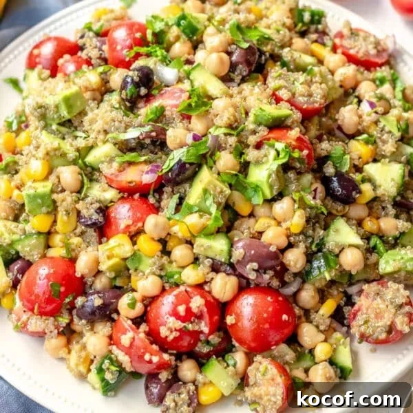 Delicious Vegan Pasta Recipes for Quick Weeknight Dinners 16 A vegan high protein meal with chickpeas, quinoa, and vegetables on a plate.
