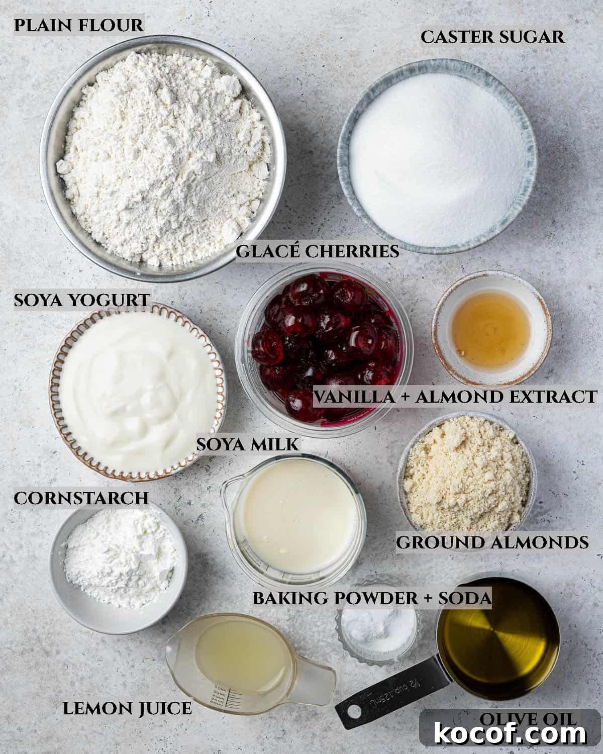 Labelled photo of the ingredients needed to make vegan cherry loaf cake.
