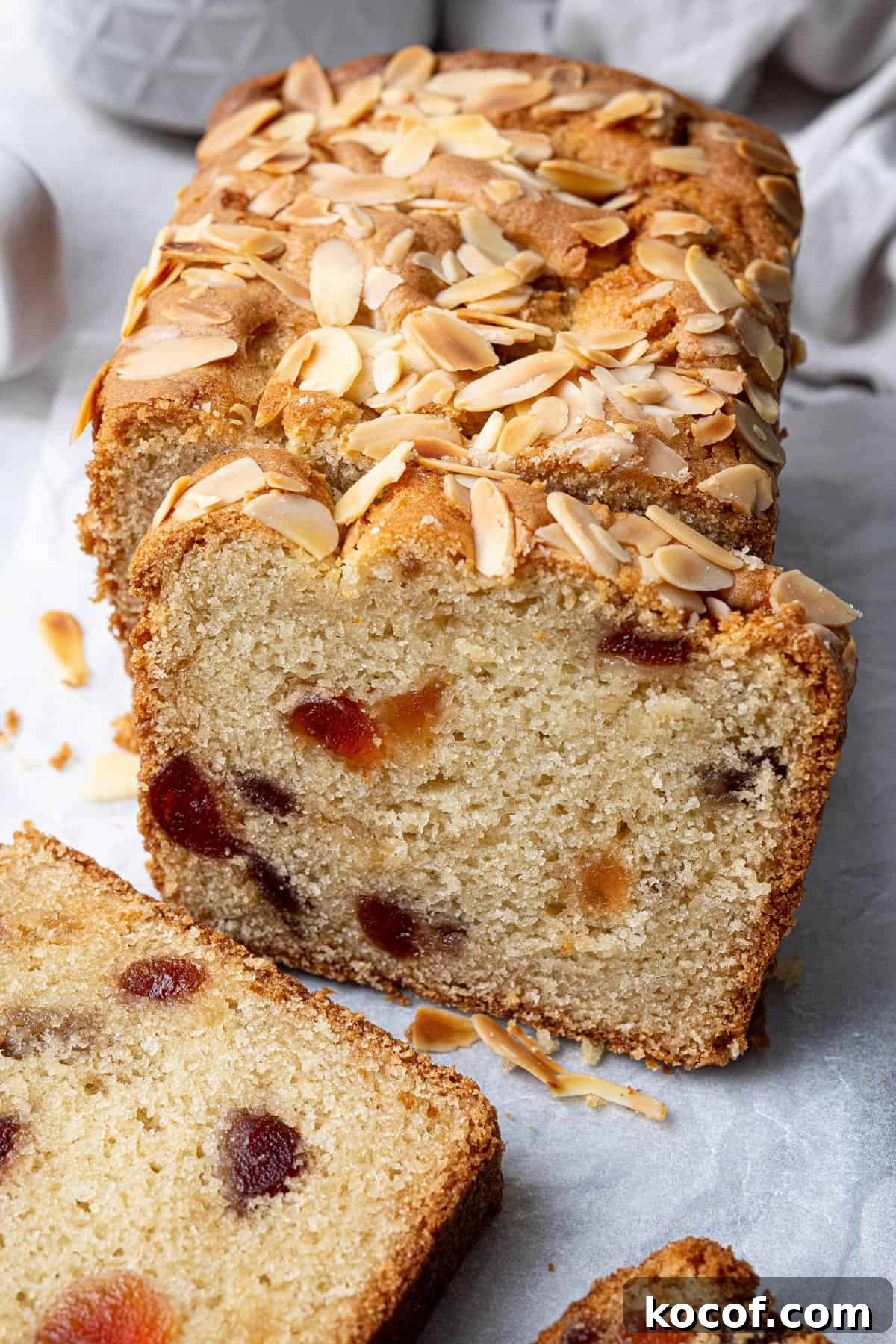 Close up of the sliced vegan chherry loaf cake.