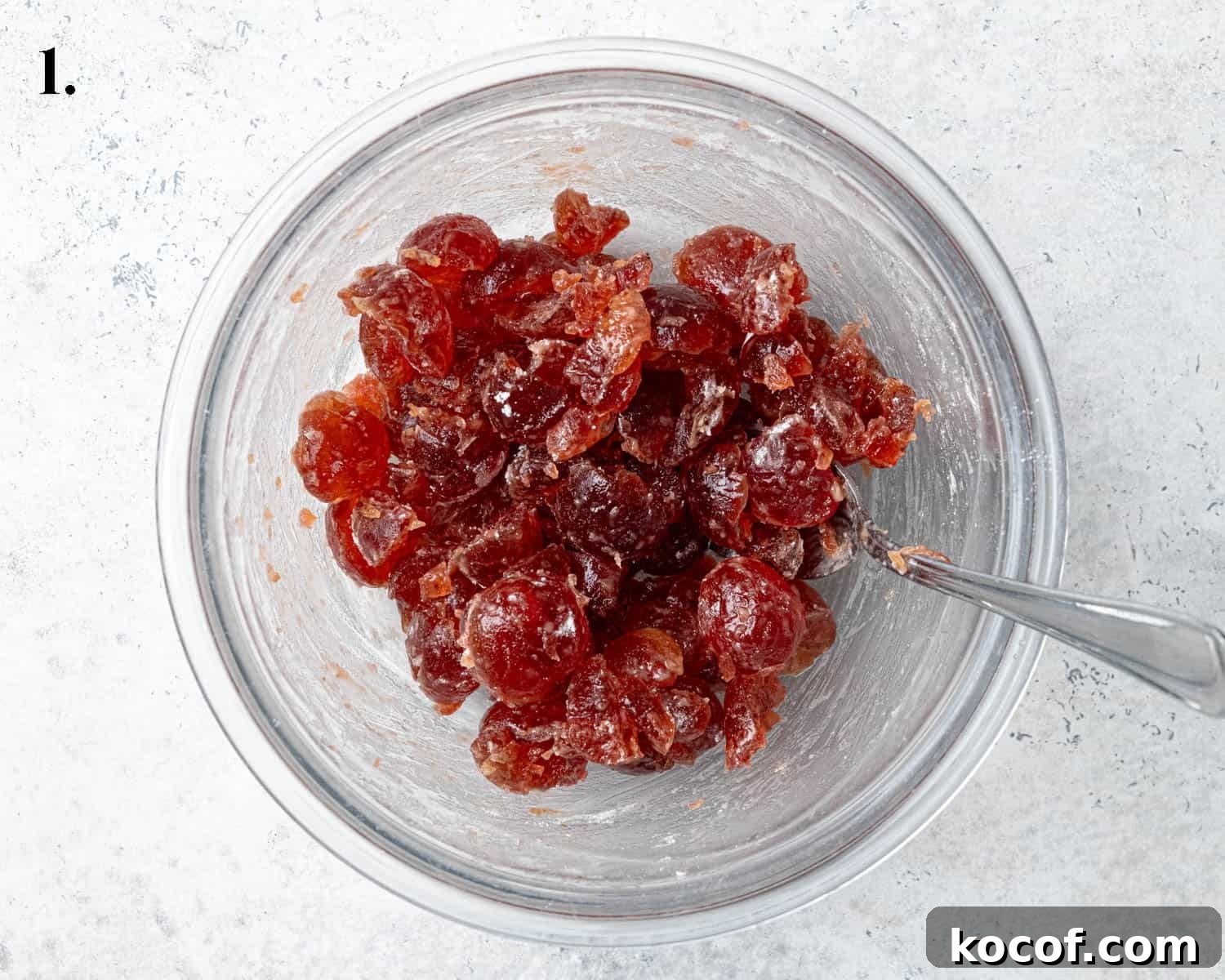 Step 1, the prepared cherries in a bowl.