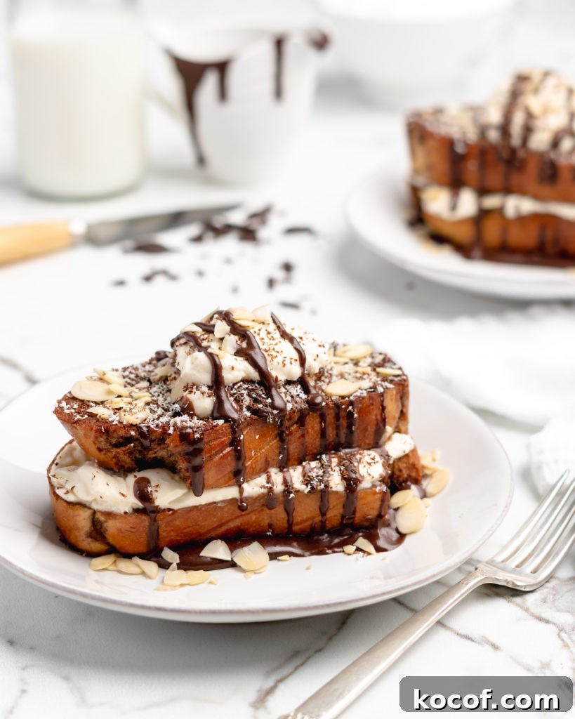 Cinnamon Bun Pancakes with Cream Cheese Frosting 9 Fluffy Tiramisu flavored French Toast is topped with a delicious dollop of mascarpone whip cream, then drizzled with dark chocolate ganache