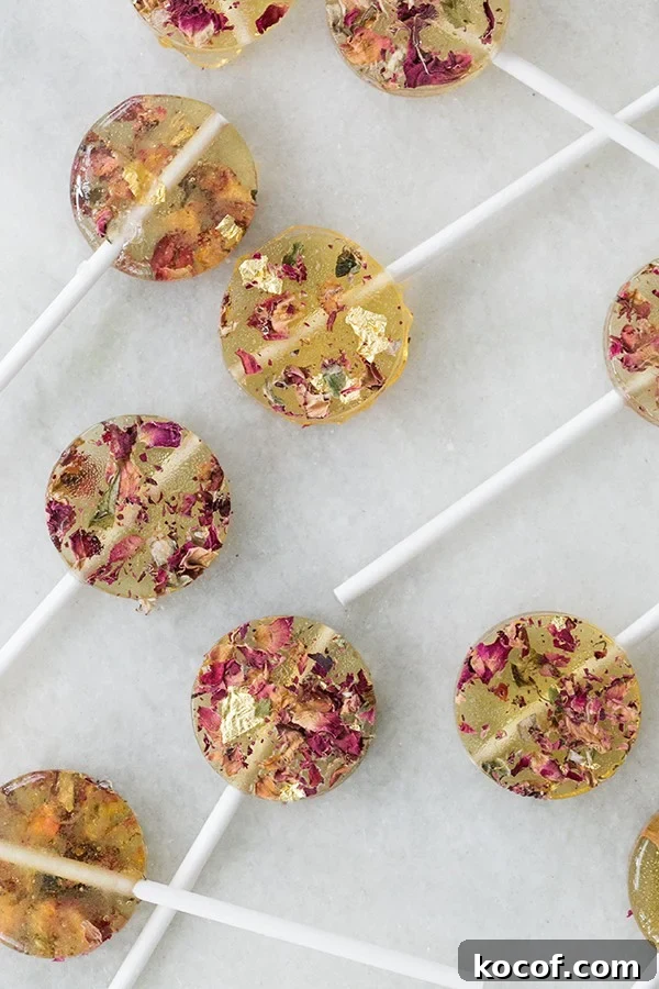 How to Make Homemade Rose Lollipops: Simple Floral Candy Recipe 3 Beautiful lollipops with edible flowers.