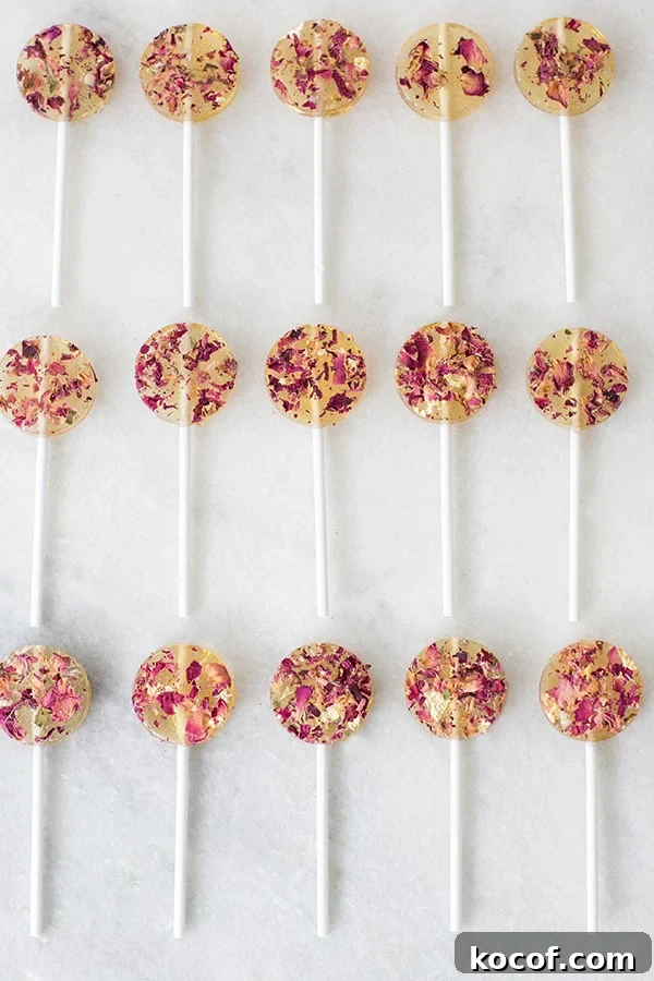 How to Make Homemade Rose Lollipops: Simple Floral Candy Recipe 5 Homemade rose lollipops with edible gold.