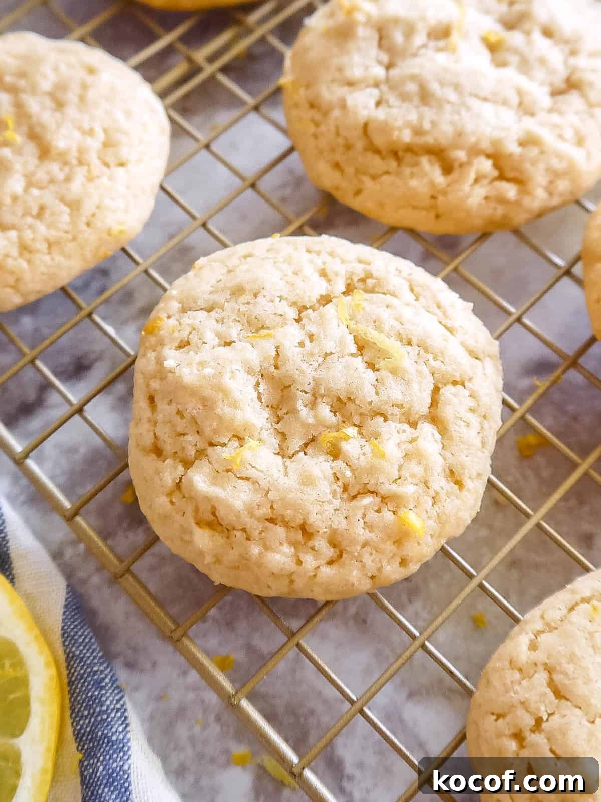 Lemon sugar cookies freshly baked and on a drying rack.