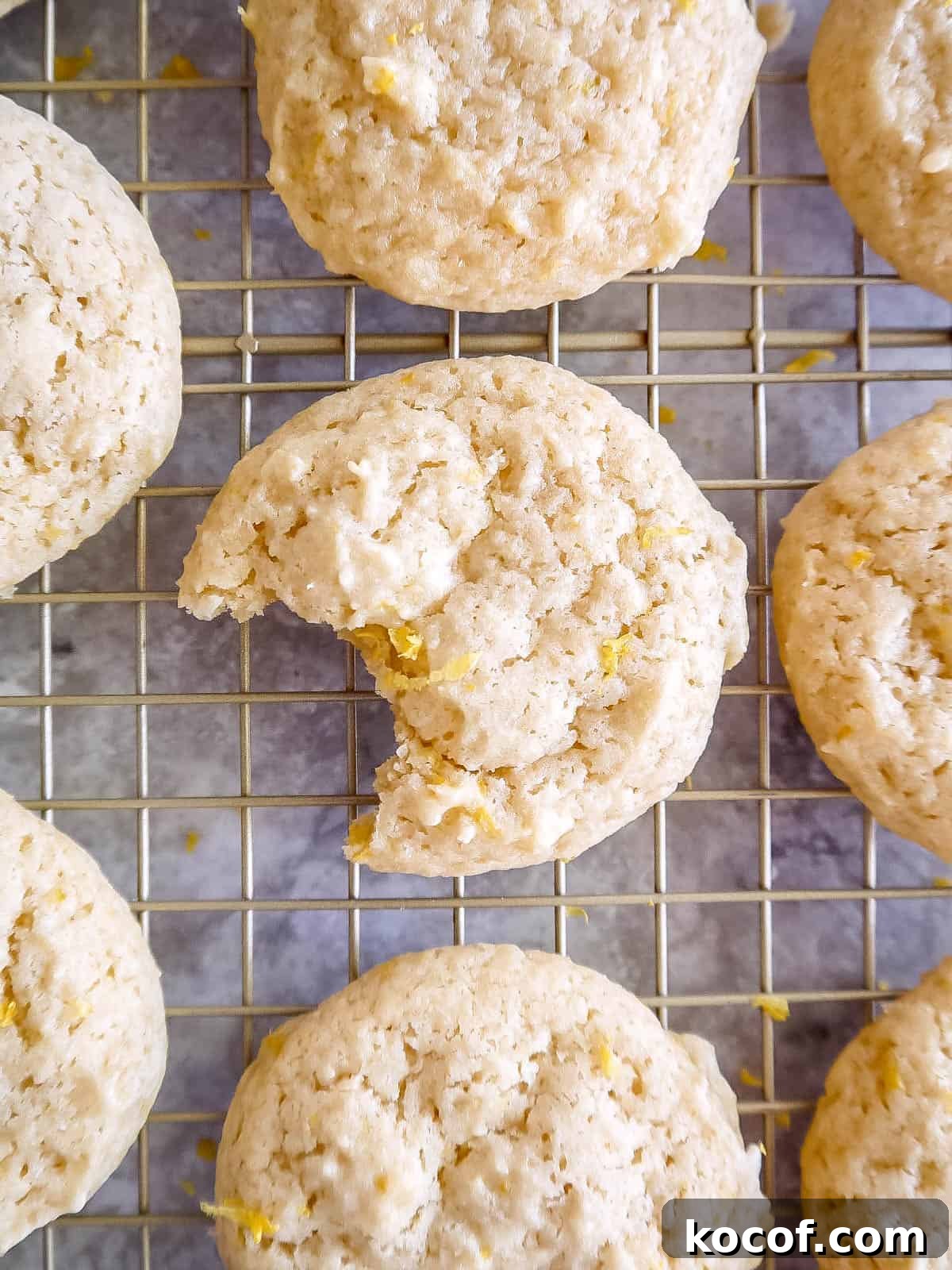A bite of a lemon sugar cookie with olive oil.