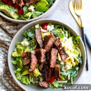Perfect Blackened Steak Recipe for a Spicy, Crisp Crust 11 Bowl with salad, egg ad blackened steak.